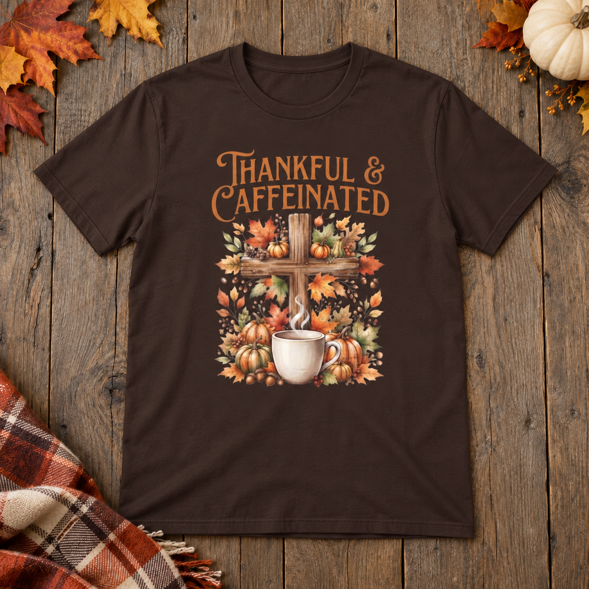 Dark Brown Thankful & Caffeinated Shirt on the shared autumn wooden background