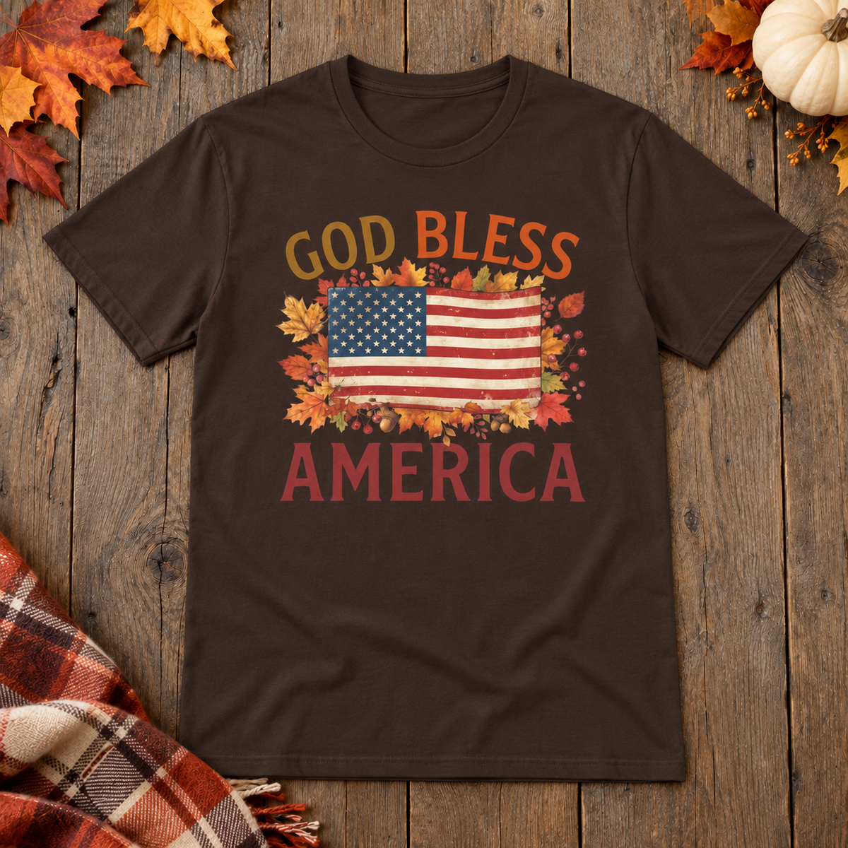 Dark Brown God Bless America Shirt on the shared autumn wooden background