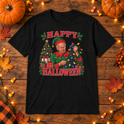 Black Joe Biden christmas elf shirt on a wooden background with Halloween lights, pumpkins and candy