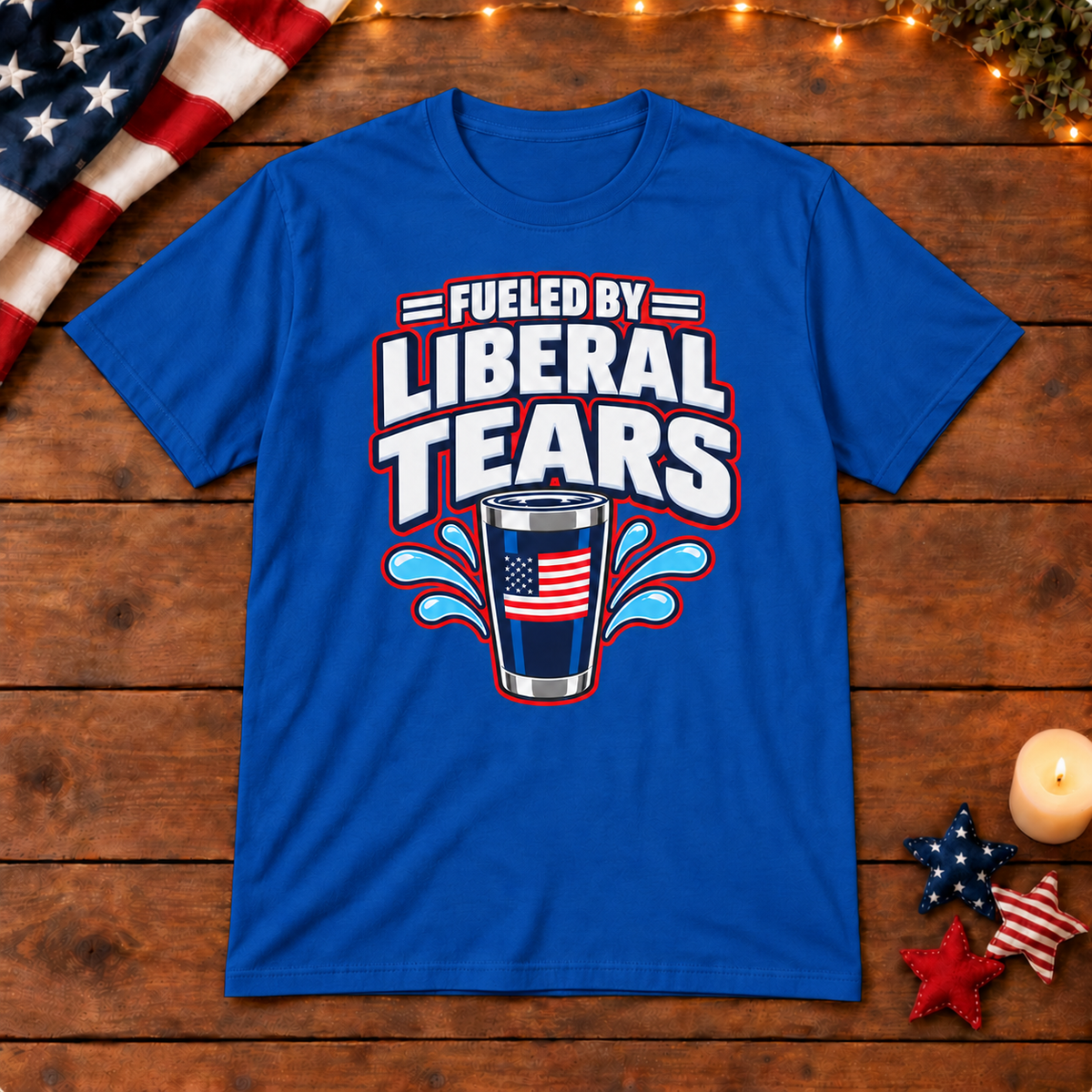Fueled by Liberal Tears Tumbler Shirt in Royal Blue, on patriotic wooden background
